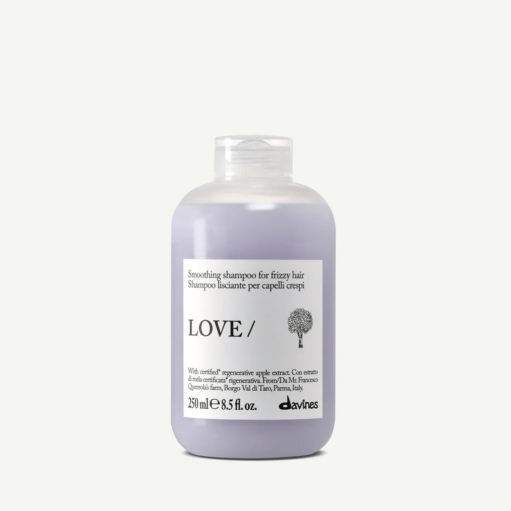 Shampoo bottle labeled 'LOVE/' on a white background