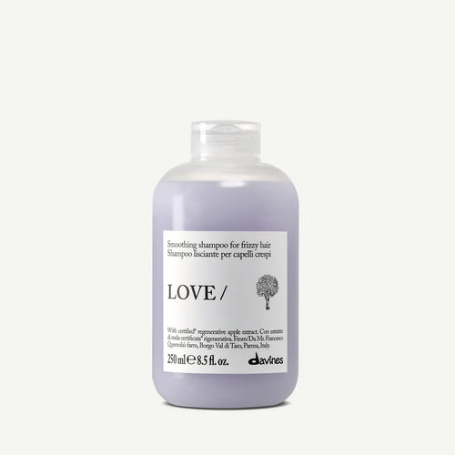 Shampoo bottle labeled 'LOVE/' on a white background